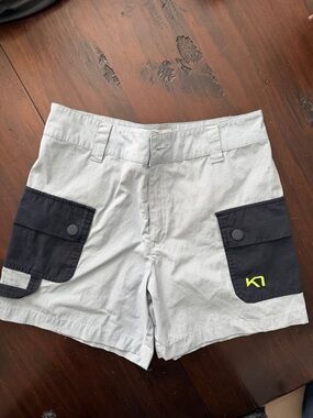 Kari Traa Light Gray Hiking Cargo Shorts with Black Pockets and Neon Logo